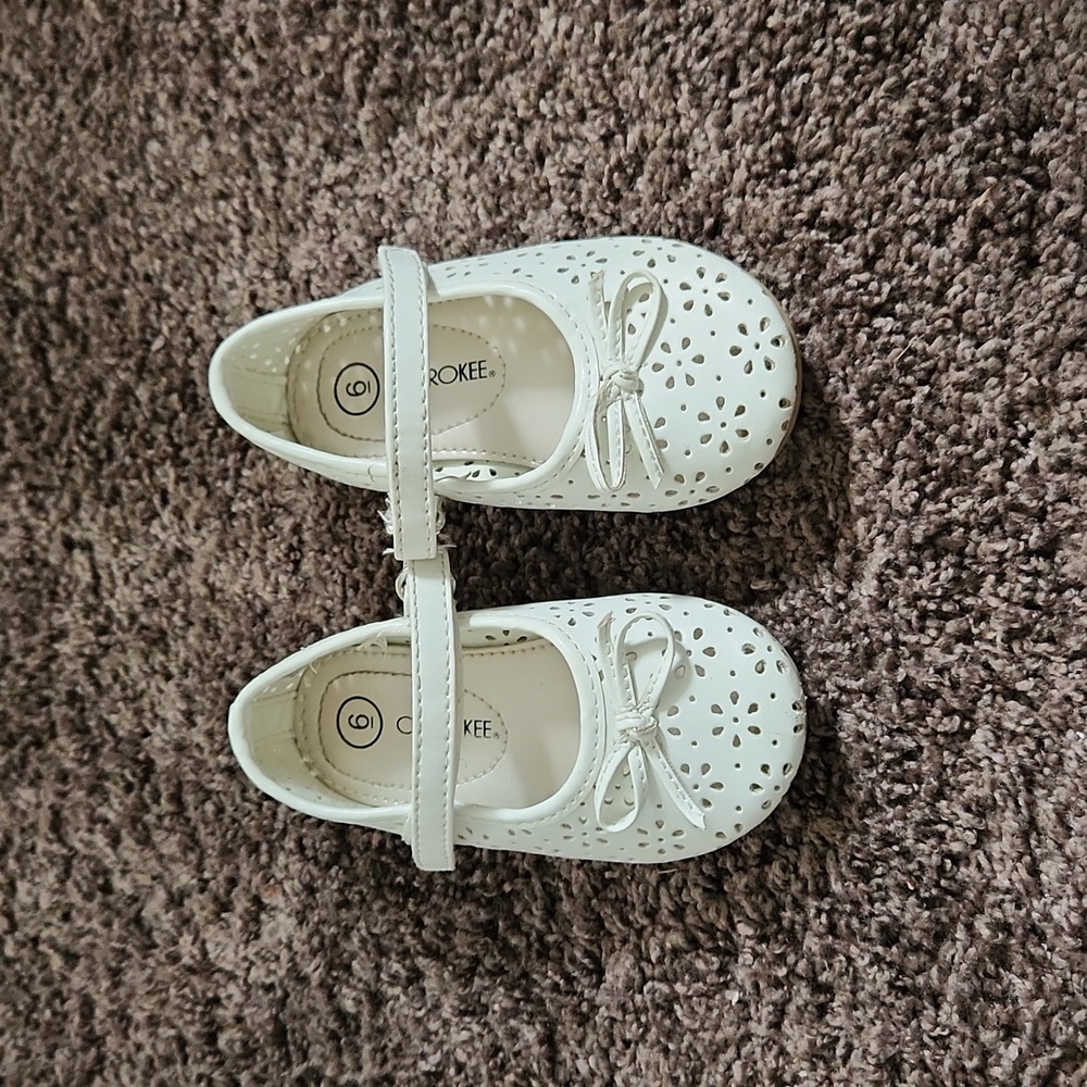 Sweet little white shoes